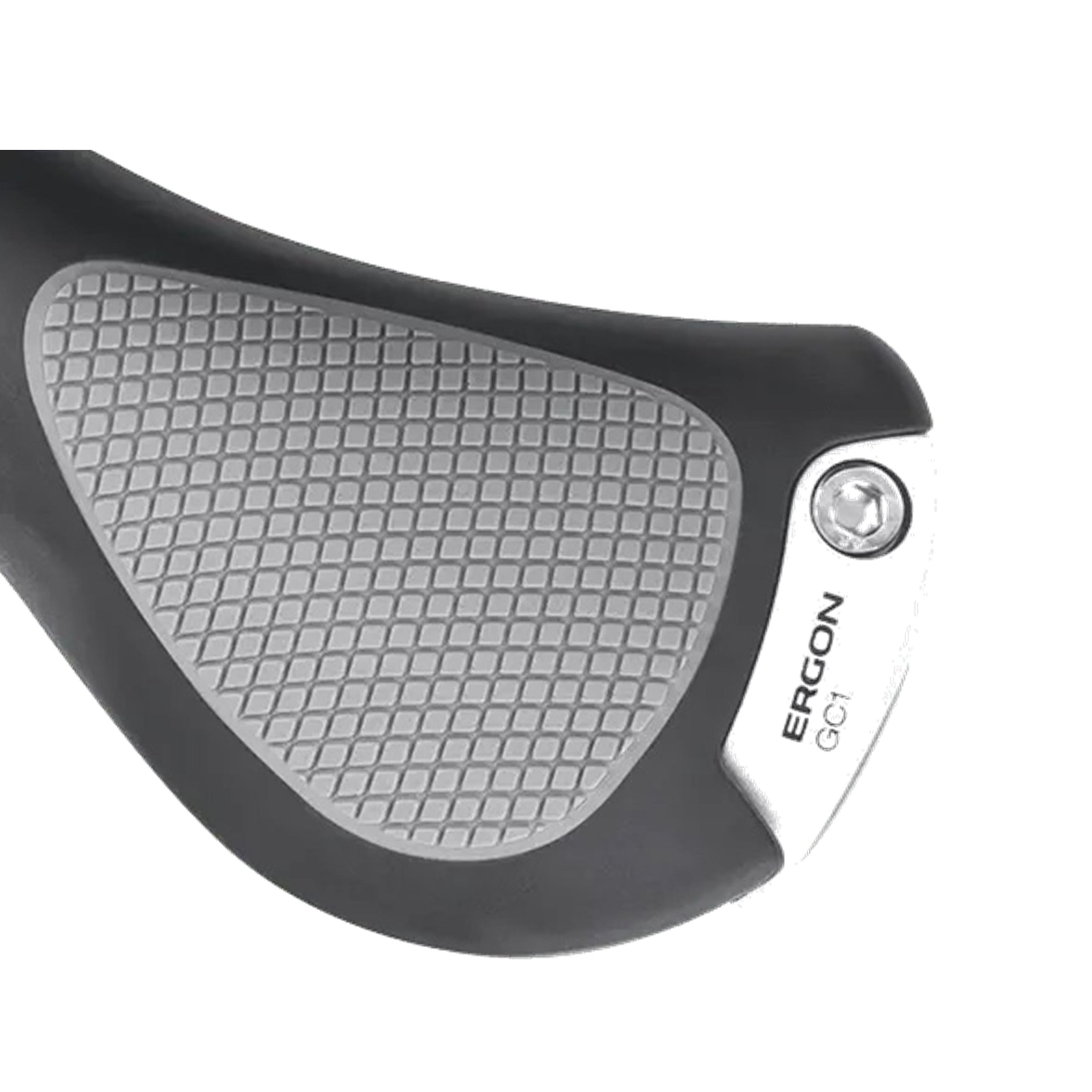 Close-up shot of an Ergon GC1 grip showing the textured surface and secure aluminium clamp