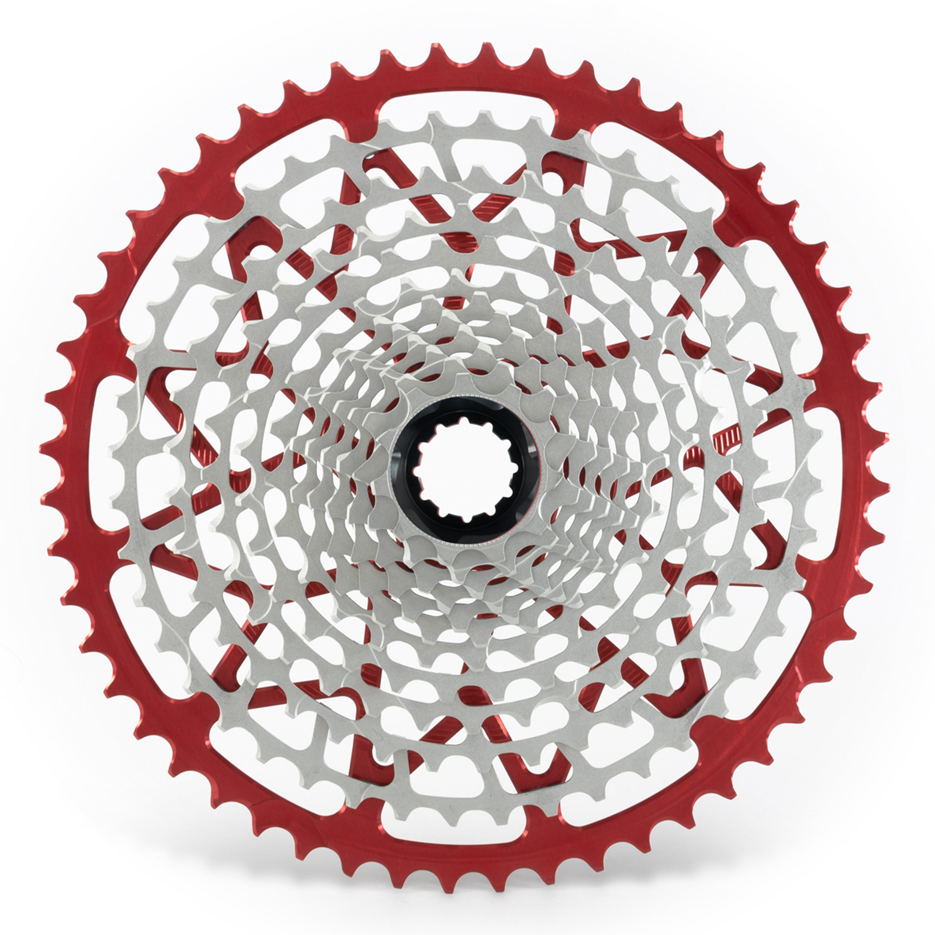 Garbaruk 12sp cassette Shimano in red, highlighting the CNC-machined monoblock construction and unique tooth profiling