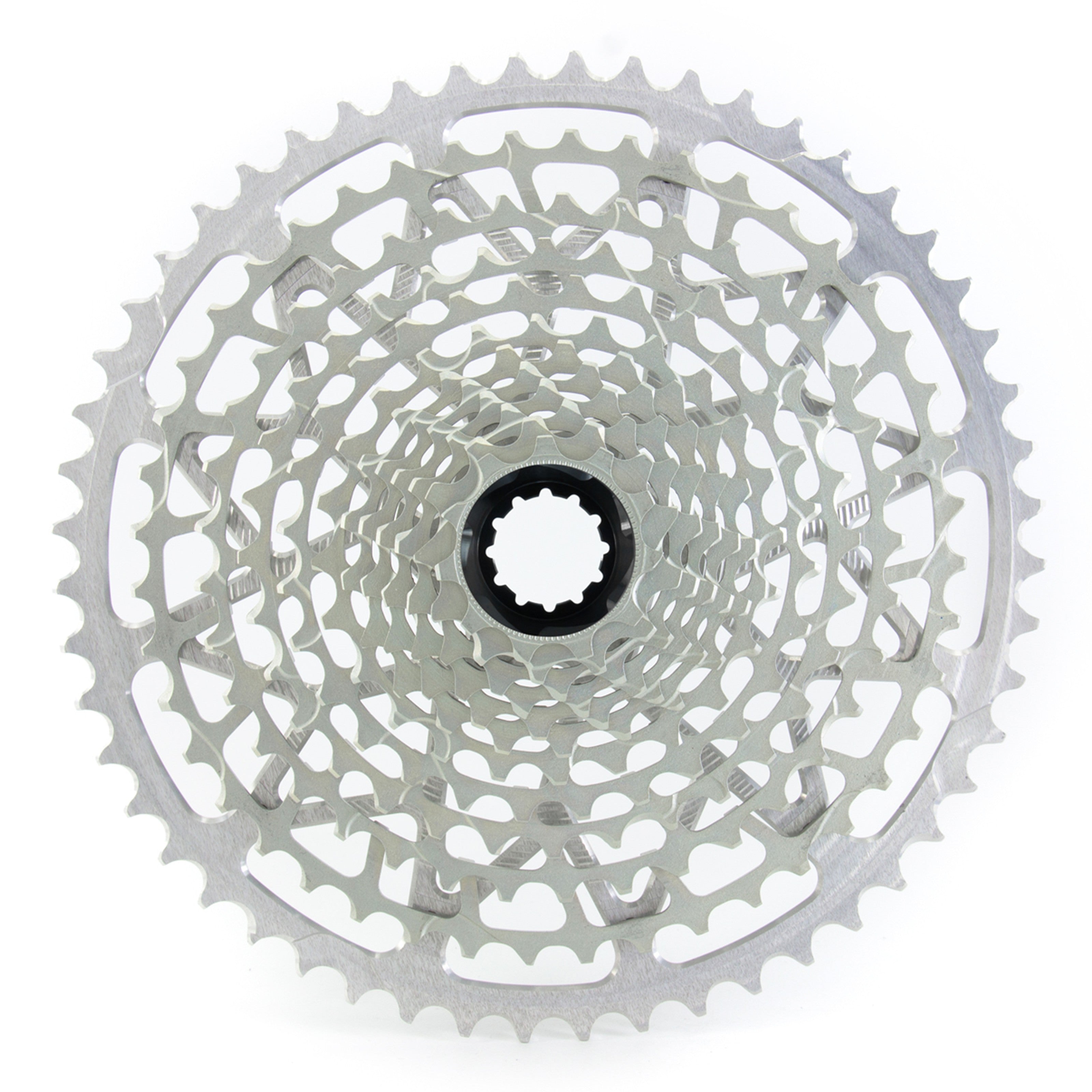 Garbaruk 12sp cassette Shimano in silver, highlighting the CNC-machined monoblock construction and unique tooth profiling