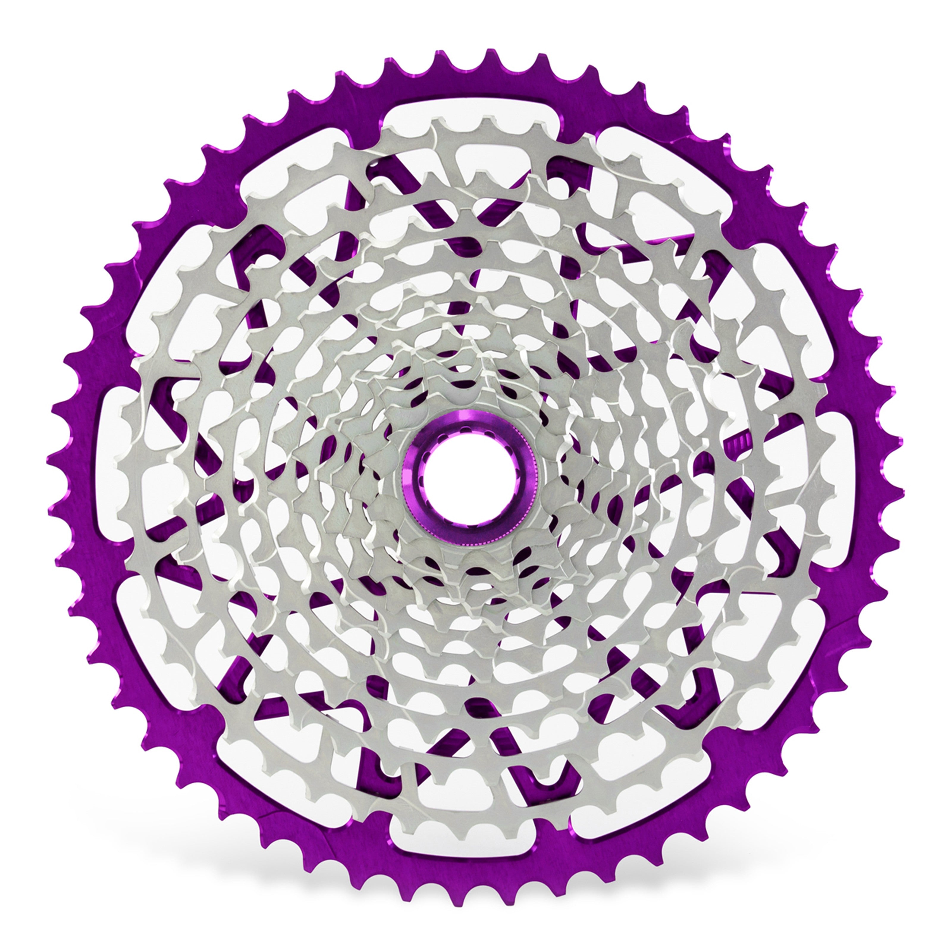 Garbaruk 12sp Shimano Microspline cassette in violet, highlighting the CNC-machined monoblock construction and unique tooth profiling