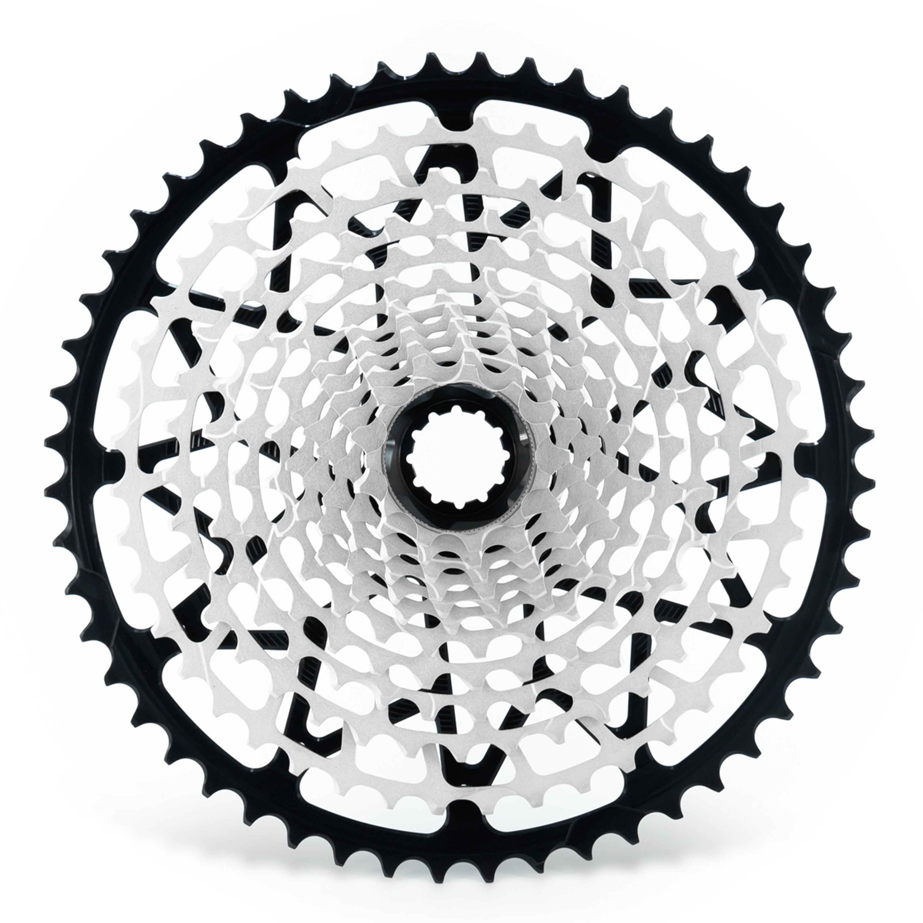 Garbaruk 12sp cassette Shimano in black, highlighting the CNC-machined monoblock construction and unique tooth profiling.