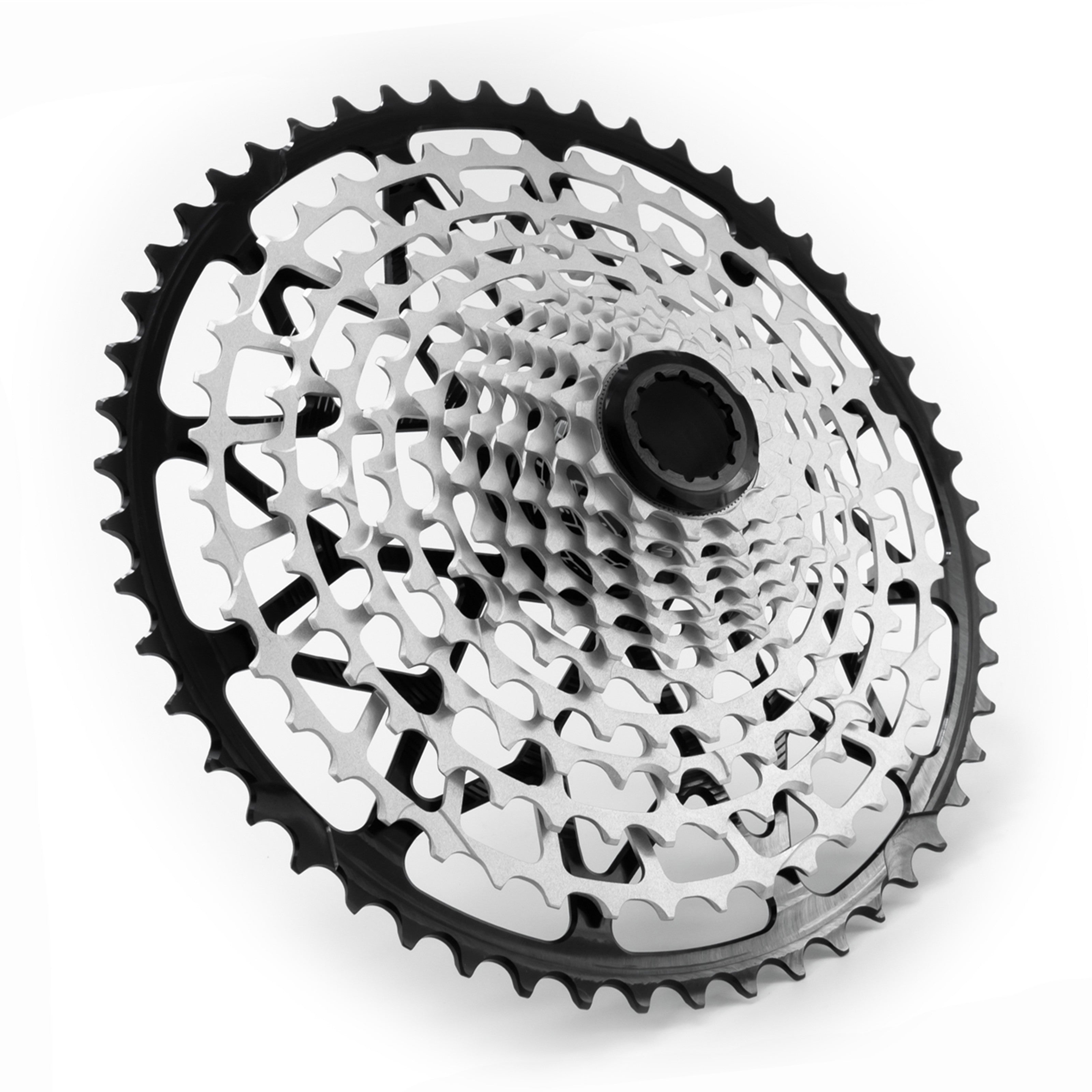 Angled view of the Garbaruk 12sp cassette Shimano in black, highlighting the CNC-machined monoblock construction and unique tooth profiling