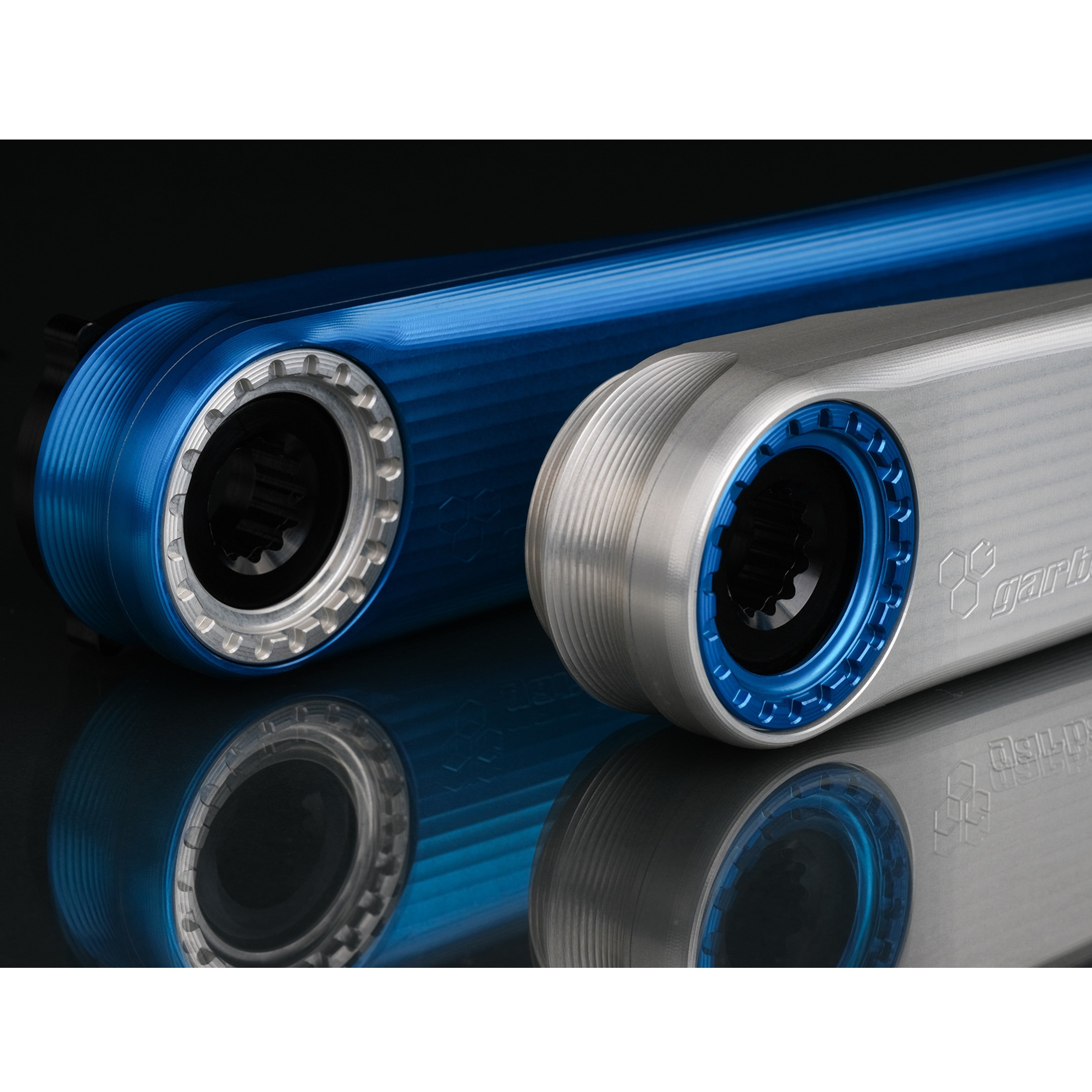 Detail of Garbaruk XC silver and blue crank arms, highlighting CNC-machined precision and machining quality
