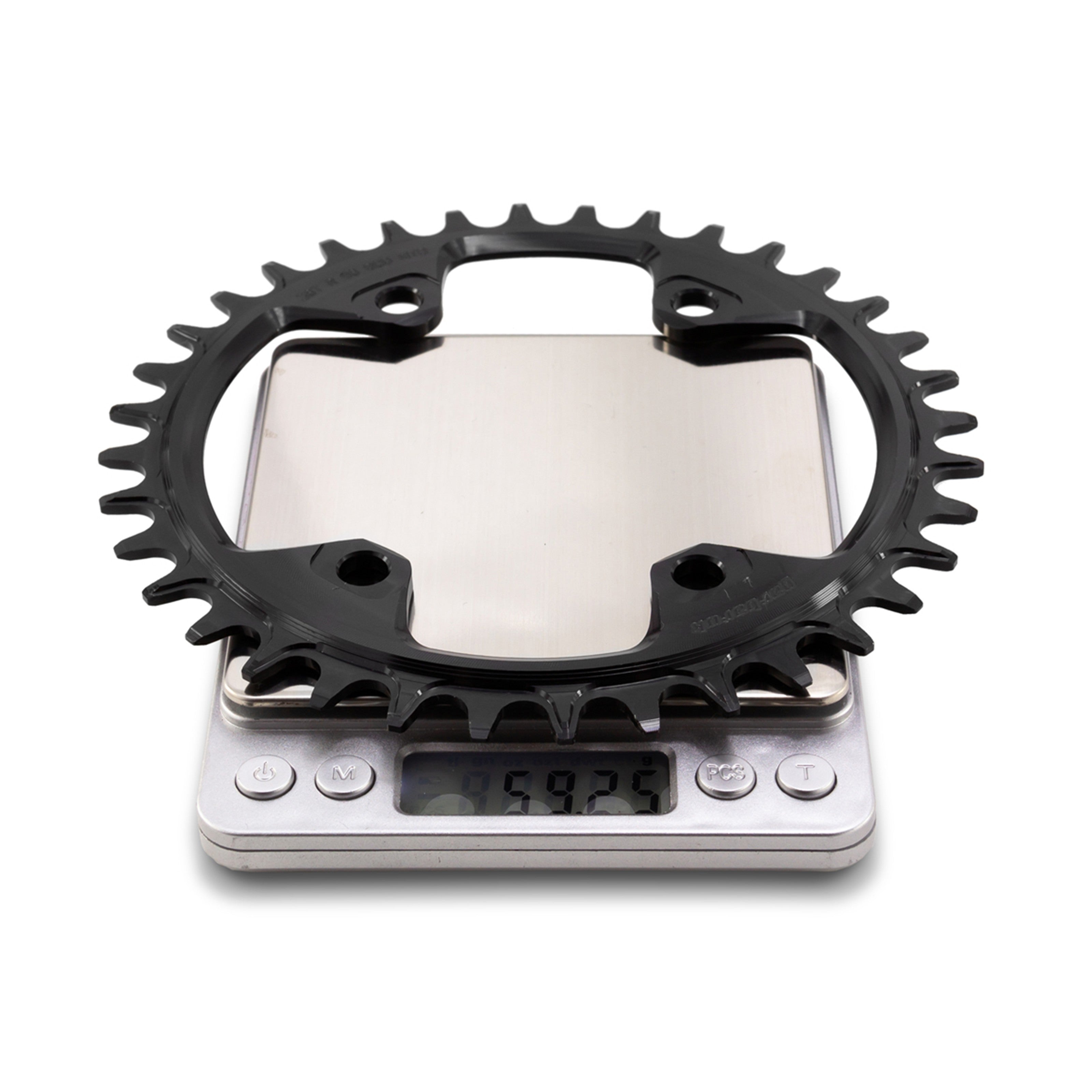 Garbaruk 96 BCD chainring for Shimano M6000 M7000 M8000 in black, displayed on digital scale to show weight (59.25g)