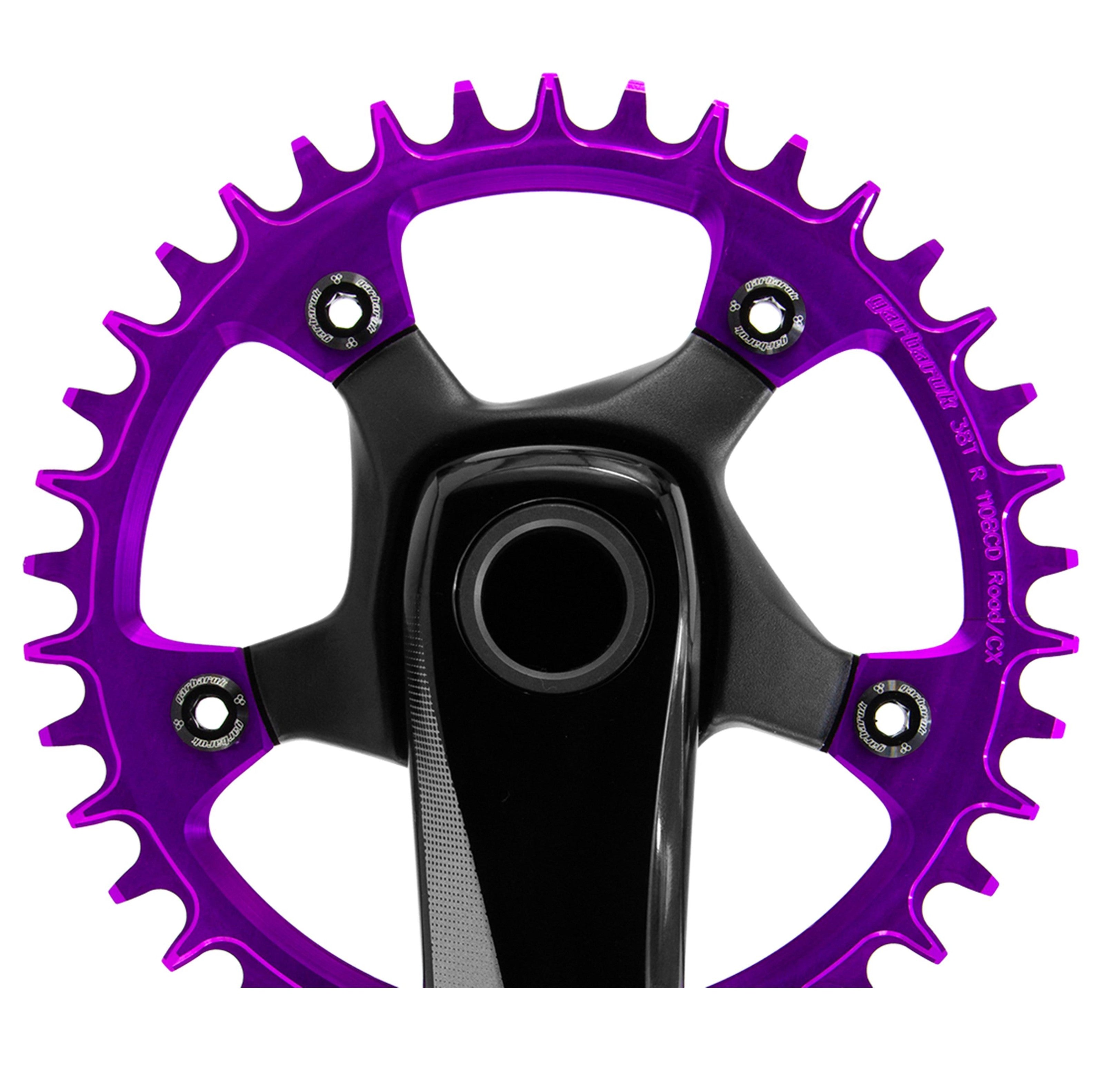 Close-up of black Garbaruk chainring bolts installed on violet Garbaruk chainring, highlighting colour contrast and secure fit