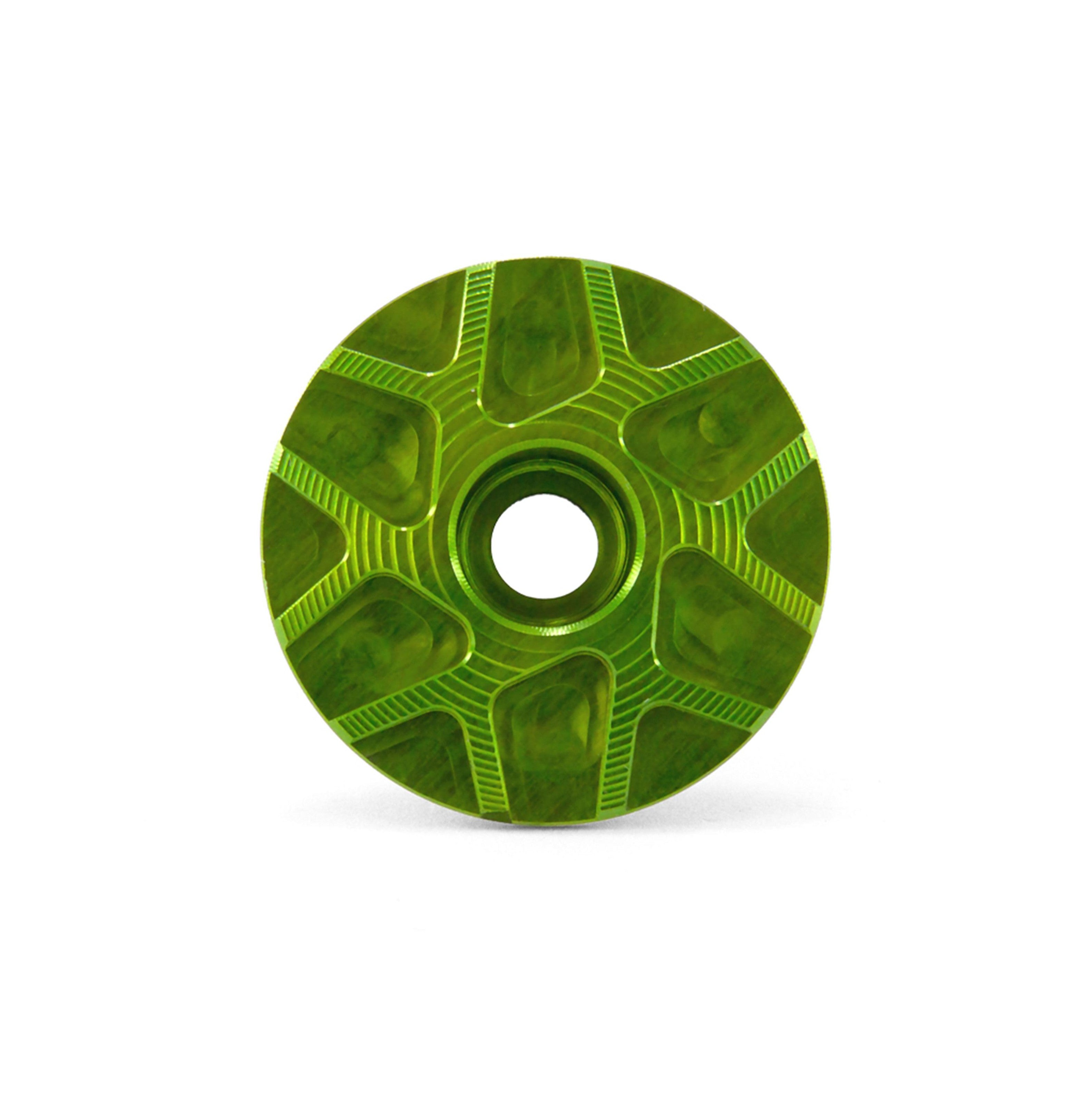 Garbaruk stem cap in green, showcasing CNC-machined detailing and precision-engineered finish