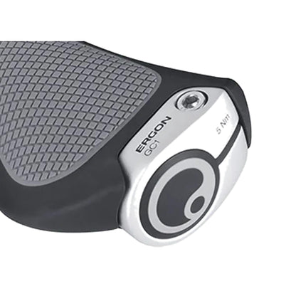 Angled view of a single Ergon GC1 ergonomic grip designed for curved handlebars showing the wing support and locking clamp