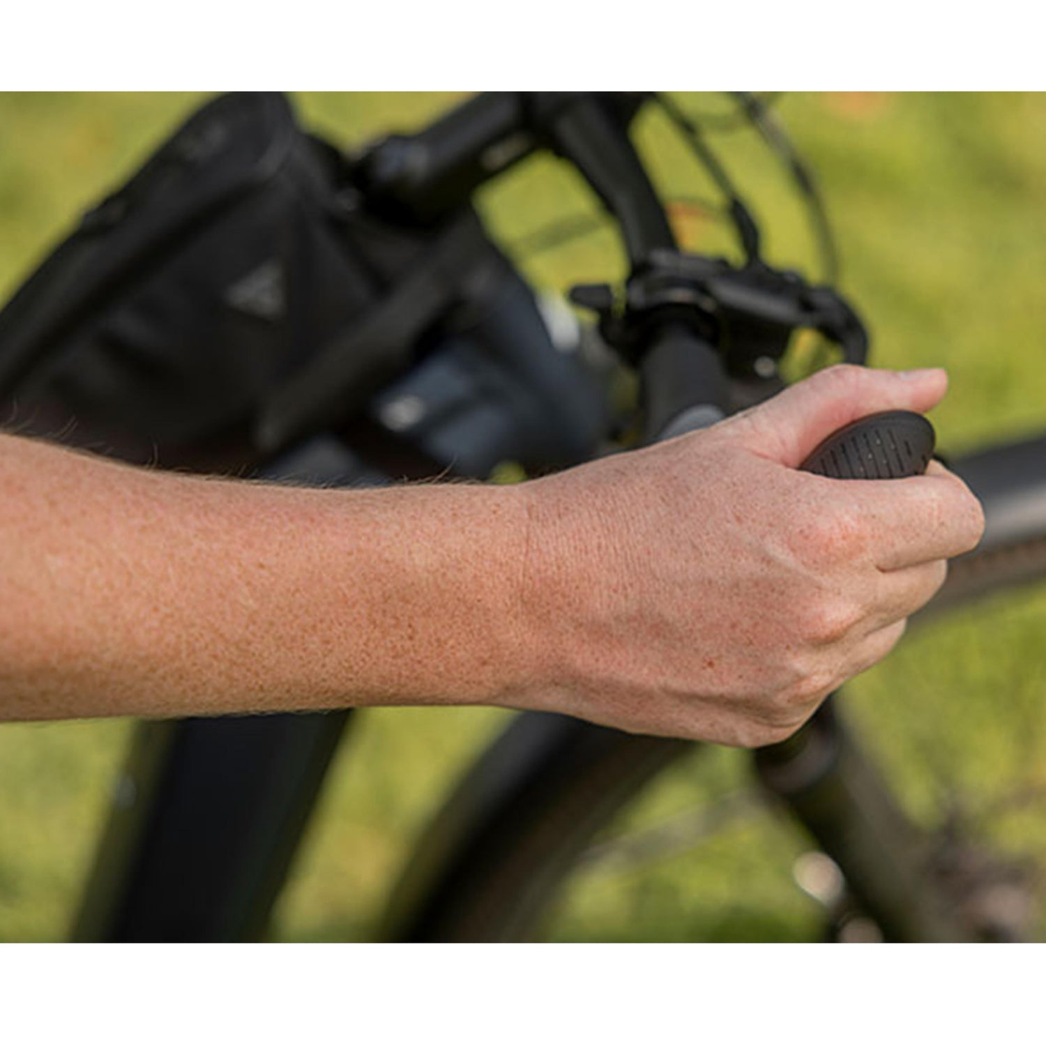 Natural wrist position on Ergon GP3 Evo ergonomic grips while riding