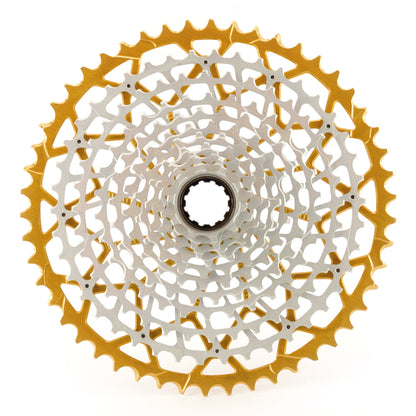 Garbaruk 11-speed SRAM XD freehub cassette in gold, studio shot highlighting the precise tooth design and anodised finish