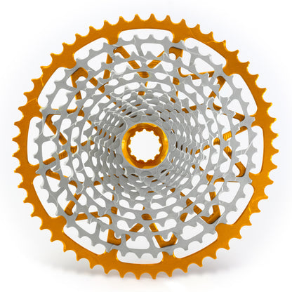 Garbaruk 12sp cassette Shimano in orange, highlighting the CNC-machined monoblock construction and unique tooth profiling