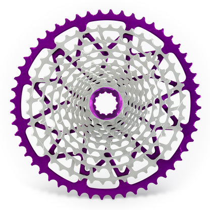Garbaruk 12sp cassette Shimano in violet, highlighting the CNC-machined monoblock construction and unique tooth profiling