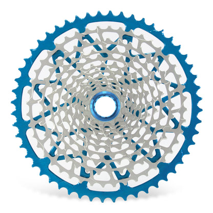 Garbaruk 12sp Shimano Microspline cassette in blue, highlighting the CNC-machined monoblock construction and unique tooth profiling