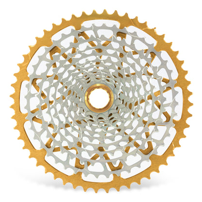 Garbaruk 12sp Shimano Microspline cassette in gold, highlighting the CNC-machined monoblock construction and unique tooth profiling