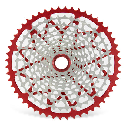 Garbaruk 12sp Shimano Microspline cassette in red, highlighting the CNC-machined monoblock construction and unique tooth profiling