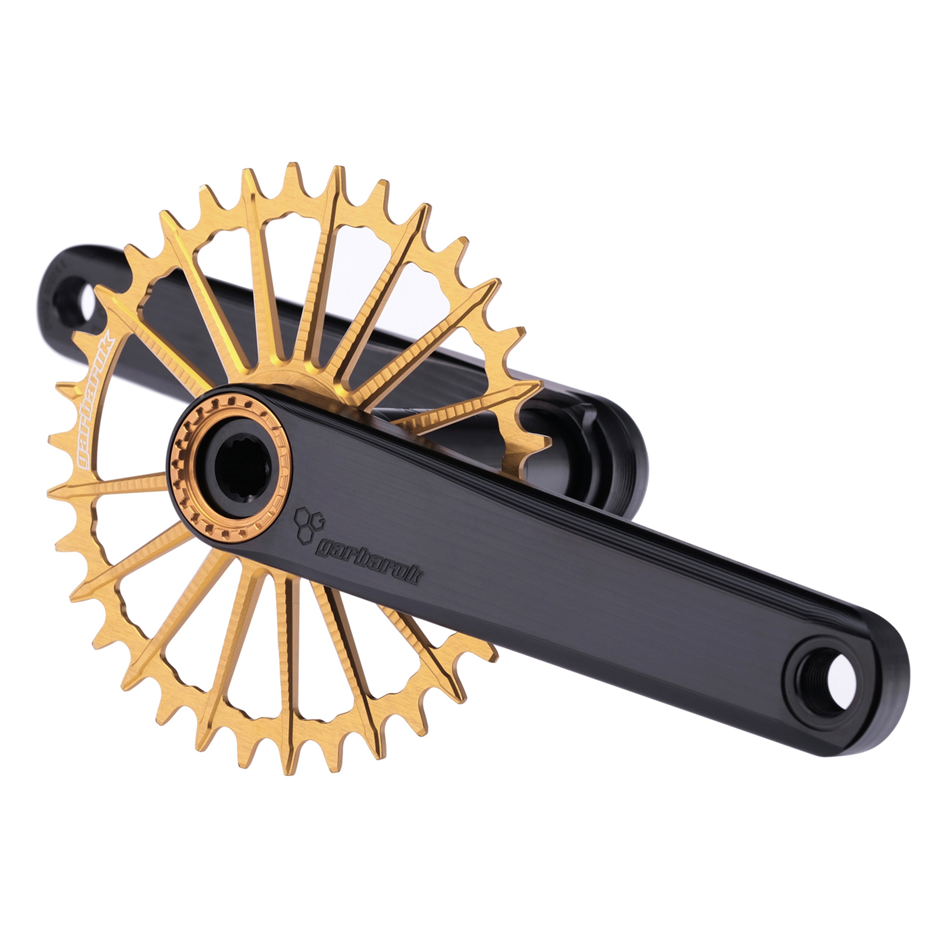 Garbaruk XC crankset in black with gold Garbaruk chainring, showing minimalist MTB design and CNC-machined detail