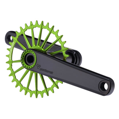 Garbaruk XC crankset in black with green Garbaruk chainring, showing minimalist MTB design and CNC-machined detail