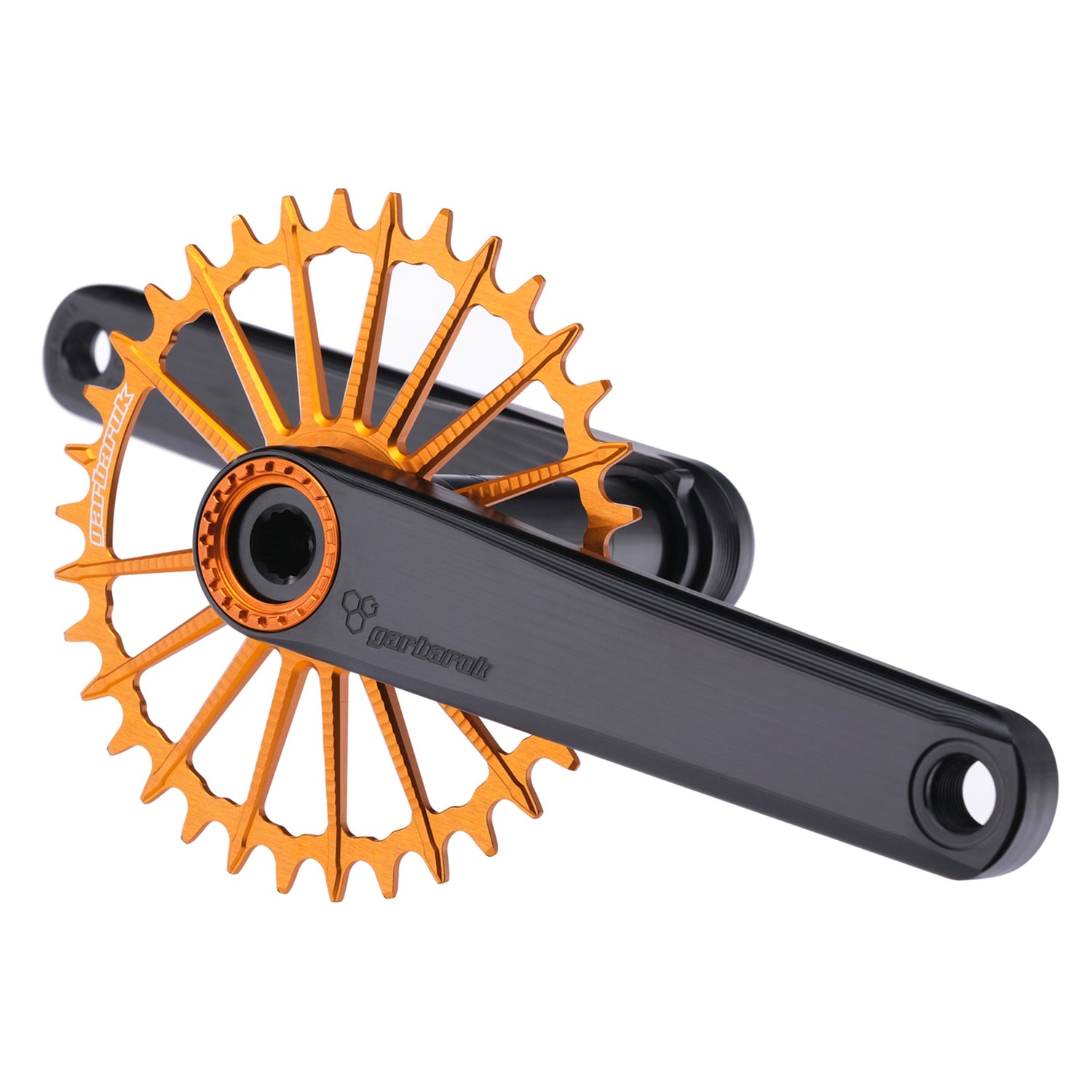 Garbaruk XC crankset in black with orange Garbaruk chainring, showing minimalist MTB design and CNC-machined detail