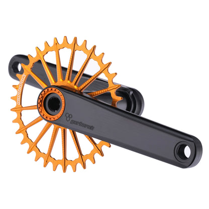 Garbaruk XC crankset in black with orange Garbaruk chainring, showing minimalist MTB design and CNC-machined detail