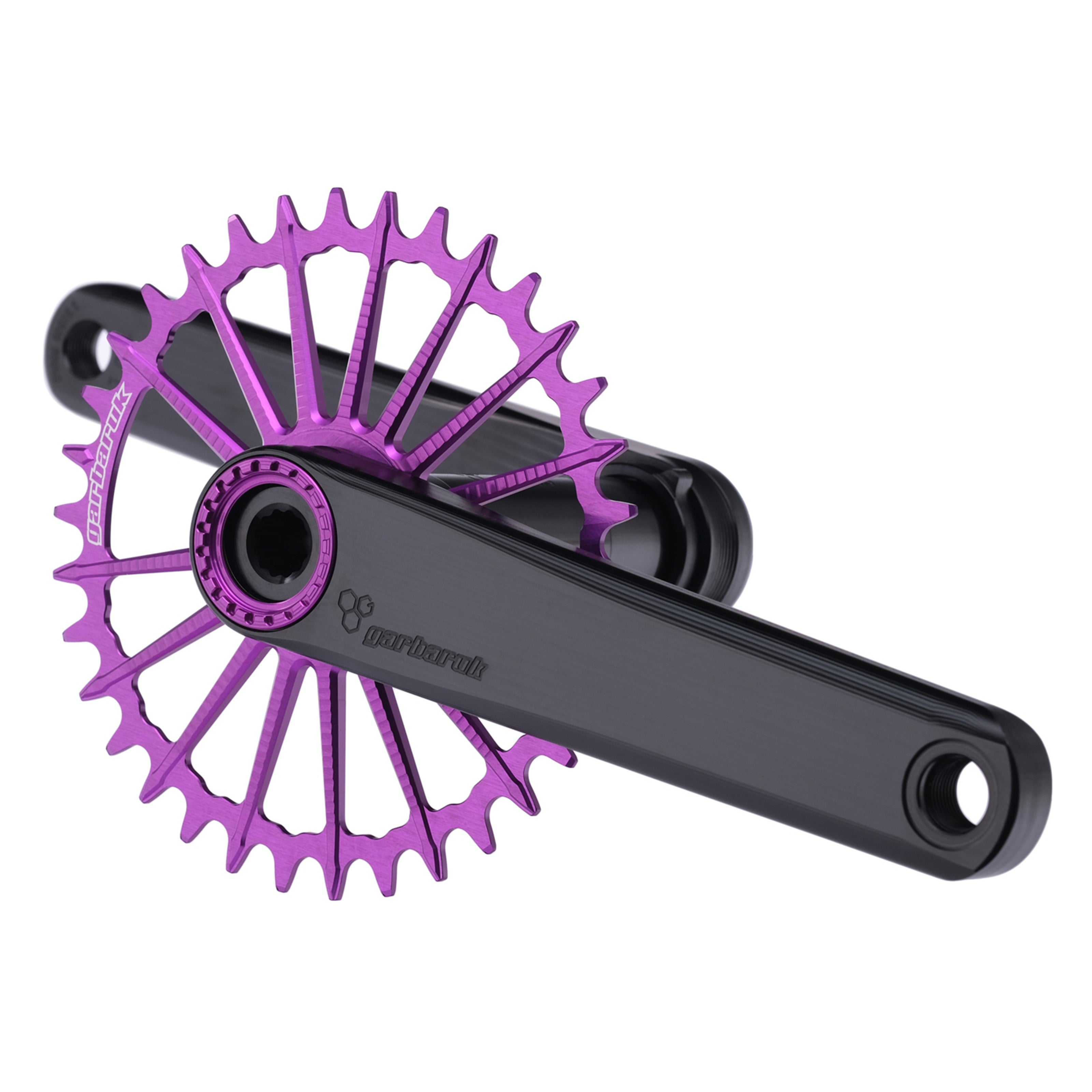 Garbaruk XC crankset in black with violet Garbaruk chainring, showing minimalist MTB design and CNC-machined detail