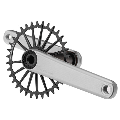 Silver Garbaruk XC crankset with black Garbaruk chainring, engineered for lightweight MTB performance and precision