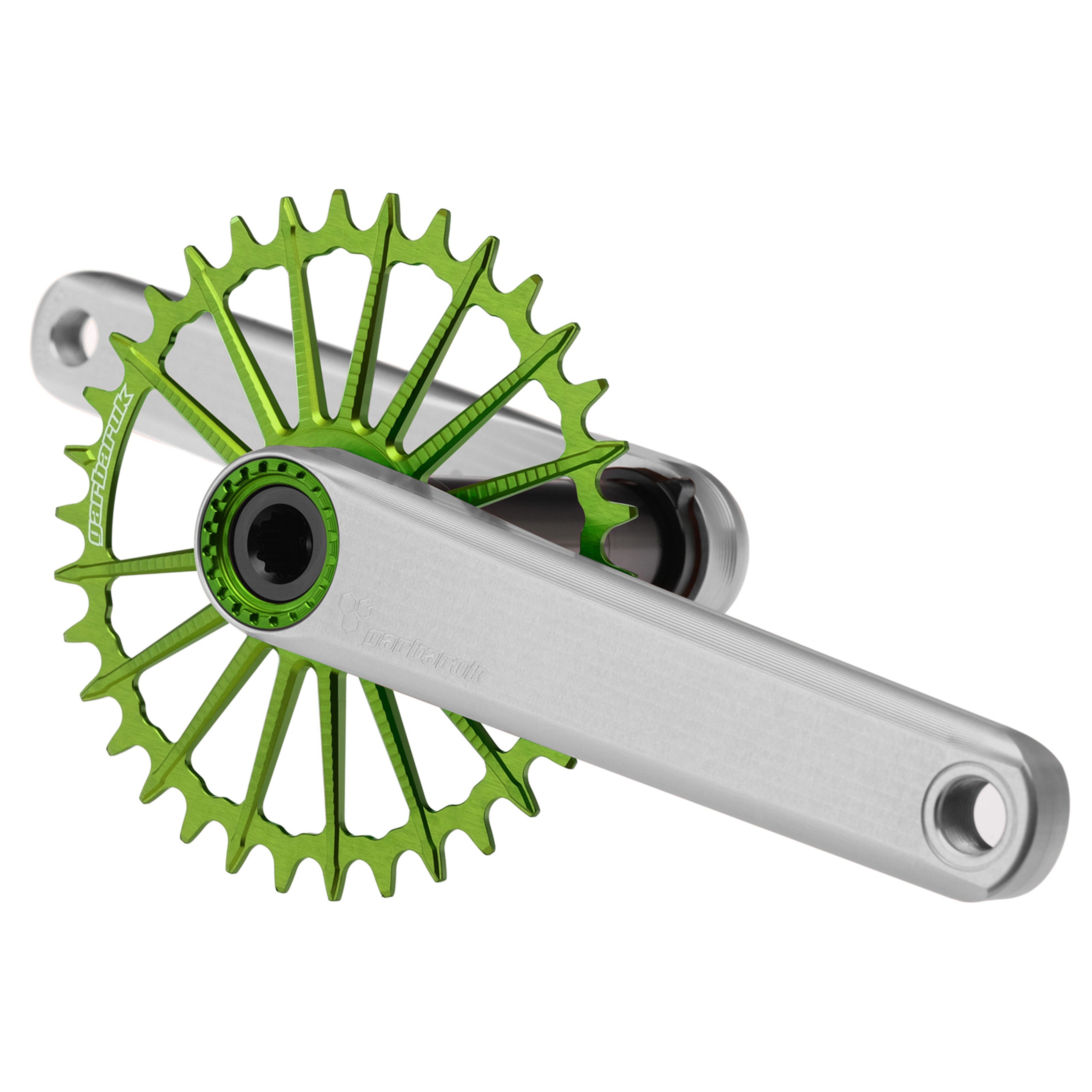 Silver Garbaruk XC crankset with green Garbaruk chainring, engineered for lightweight MTB performance and precision