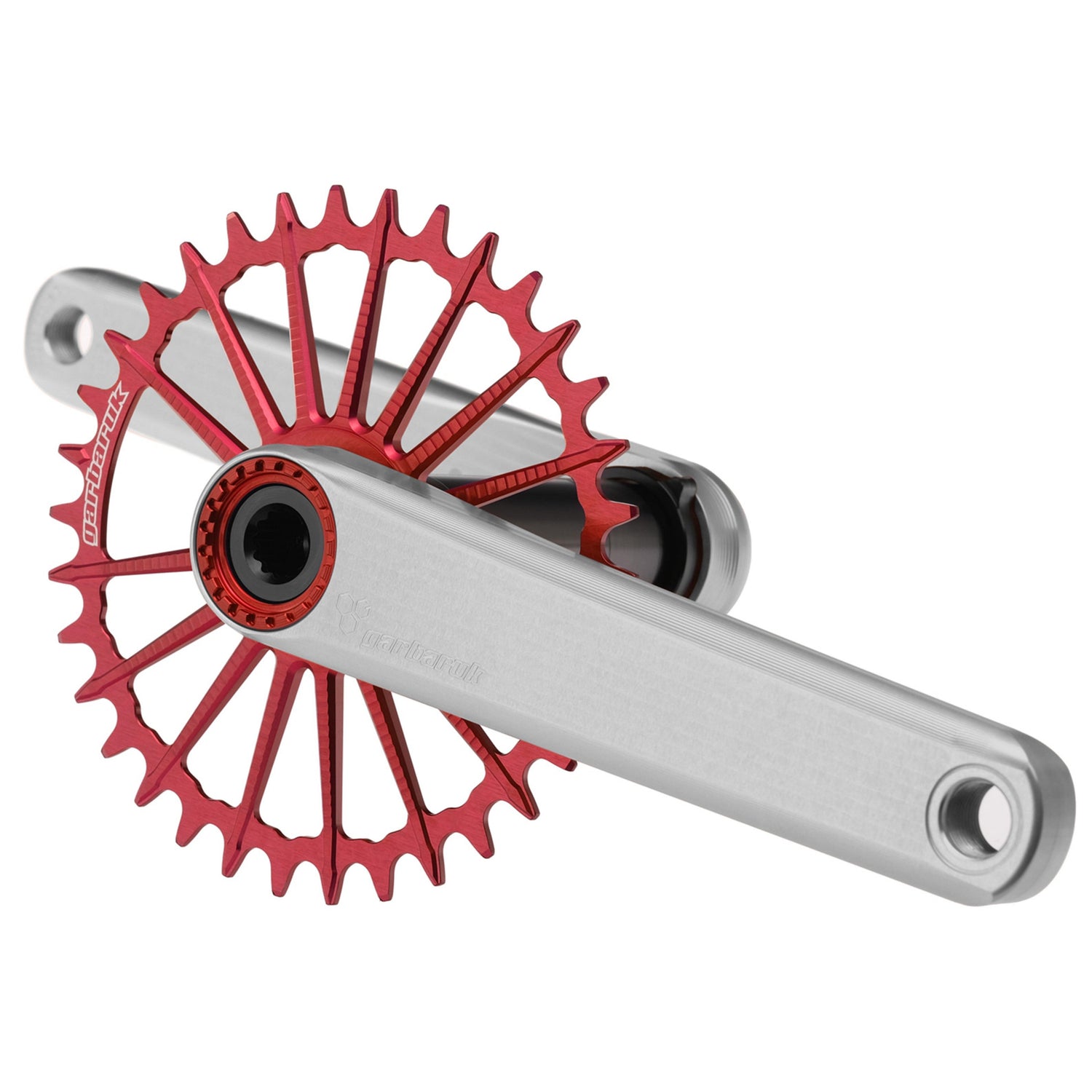Silver Garbaruk XC crankset paired with a red narrow-wide Garbaruk chainring, designed for optimal power transfer