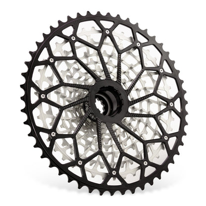 Garbaruk 11-speed SRAM XD freehub cassette in black, angled view from the rear showing largest anodised cog, precision-machined sprockets and robust build quality
