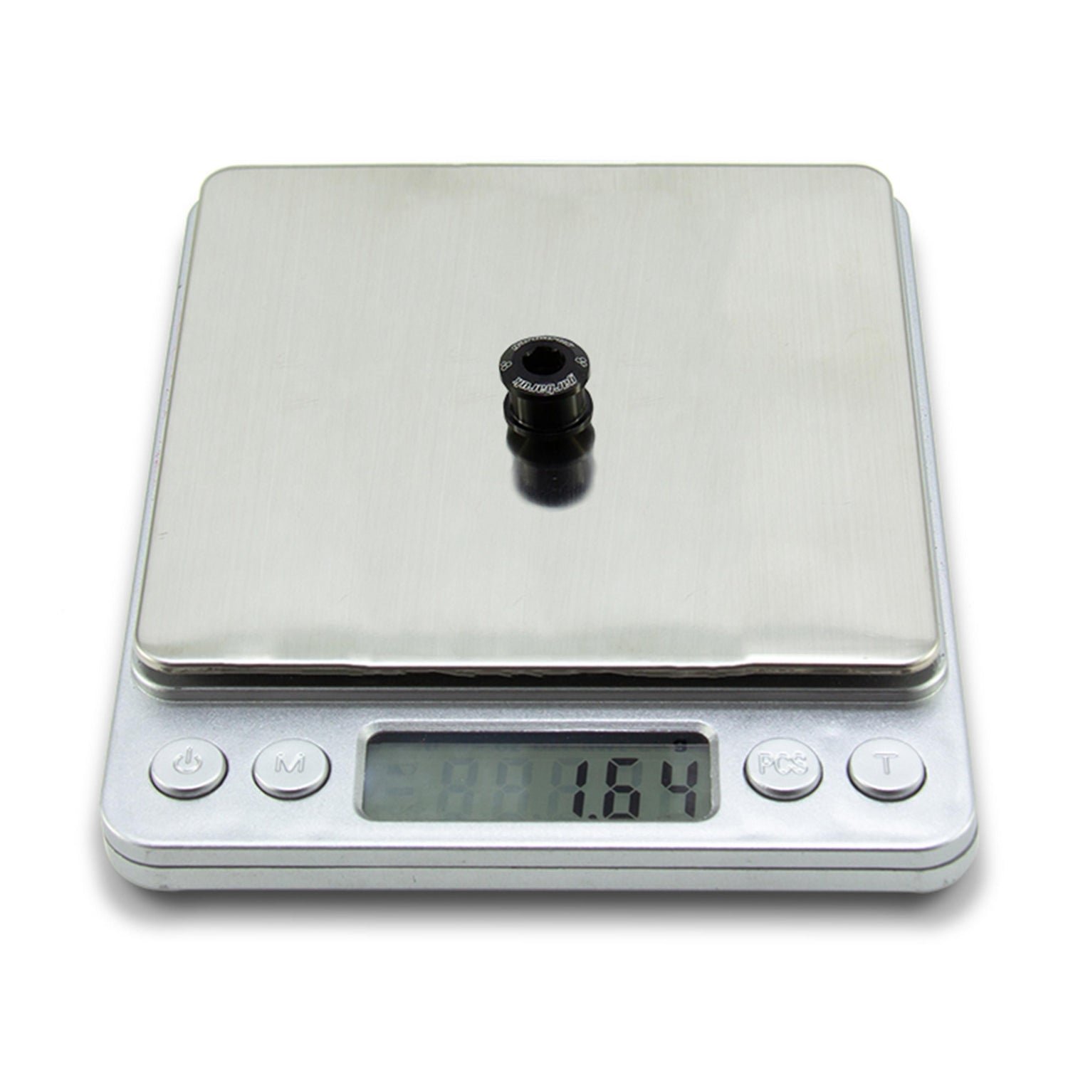 Black Garbaruk chainring bolt on digital scale showing individual weight (1.64g)