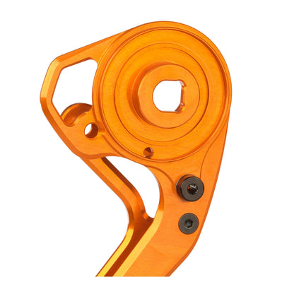 Close-up detail of Garbaruk pulley wheels and derailleur cage for SRAM Force AXS, orange, revealing detailed CNC machining and anodised finish