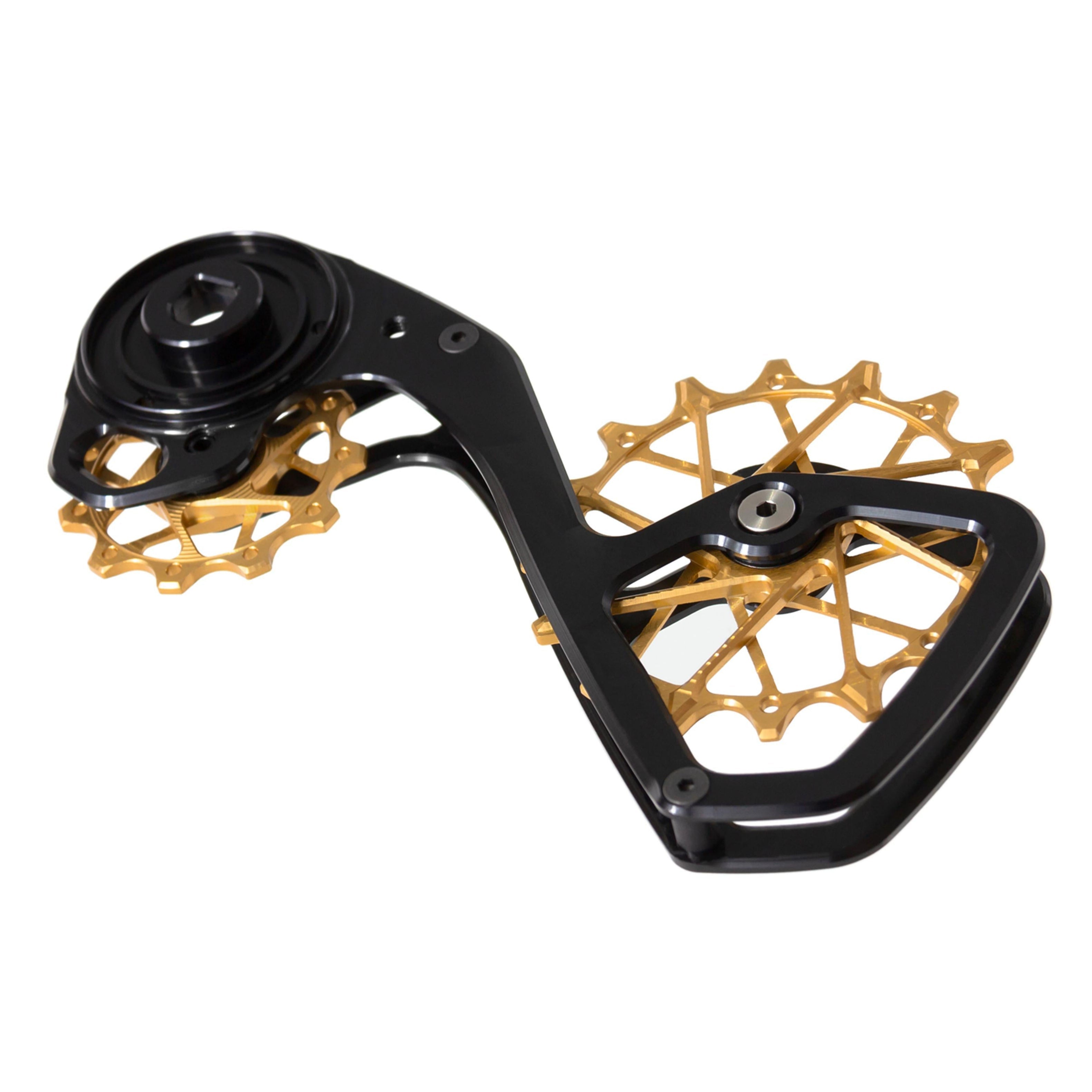 Angled view of Garbaruk derailleur cage and pulleys kit for SRAM Force AXS 12-speed in black and gold, featuring oversized CNC-machined pulleys and lightweight cage design