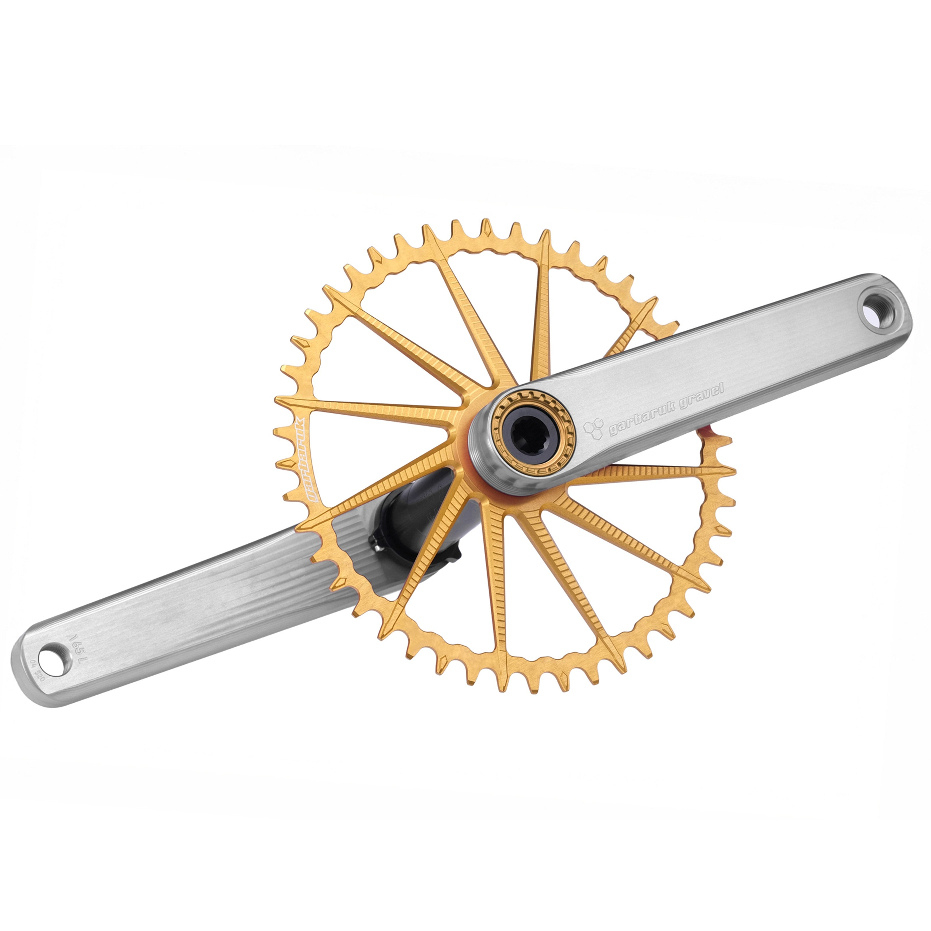 Garbaruk road/gravel crankset in silver with a gold Garbaruk chainring installed, showcasing CNC-machined design and precise, beautiful aesthetics