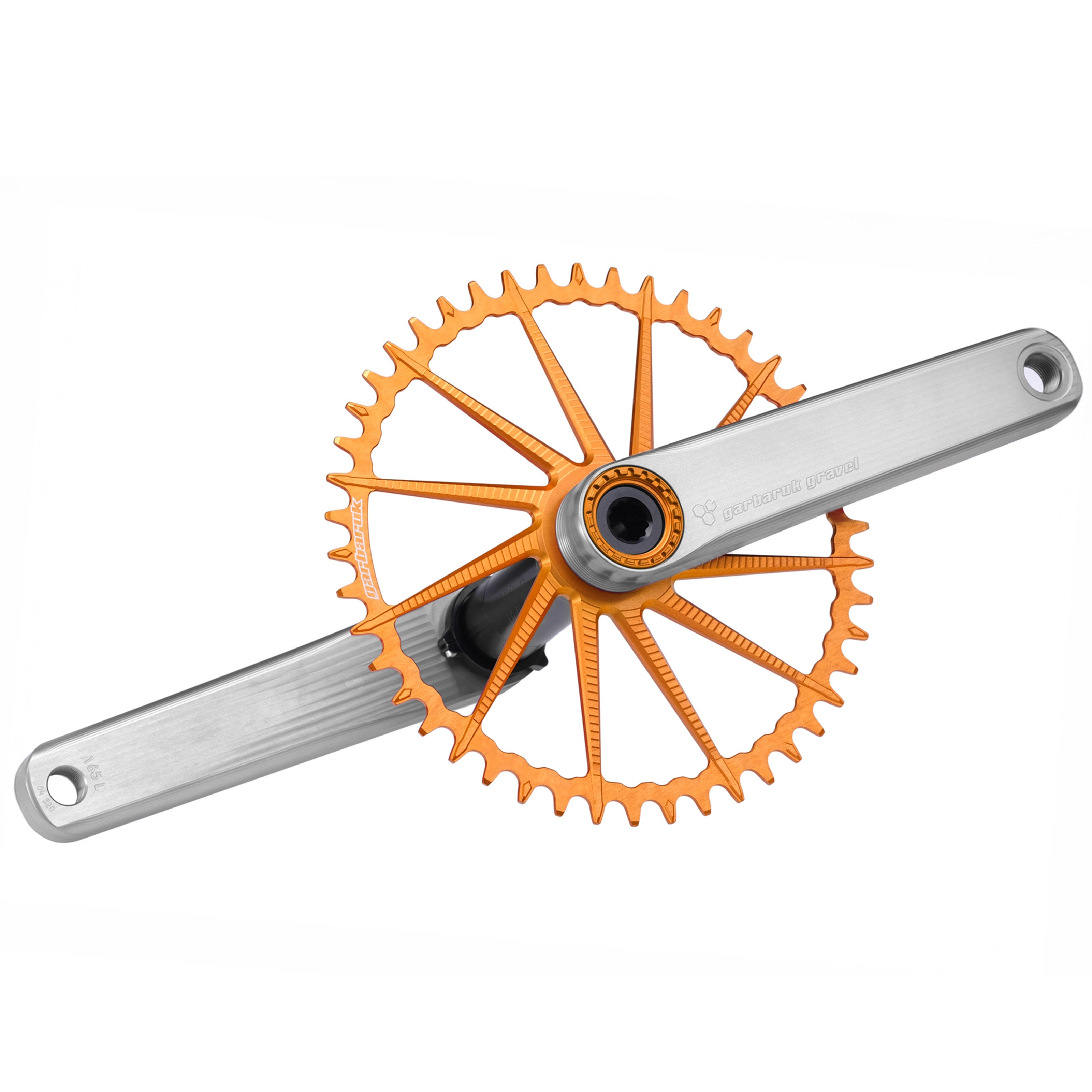 Garbaruk road/gravel crankset in silver with an orange Garbaruk chainring installed, showcasing CNC-machined design and precise, beautiful aesthetics