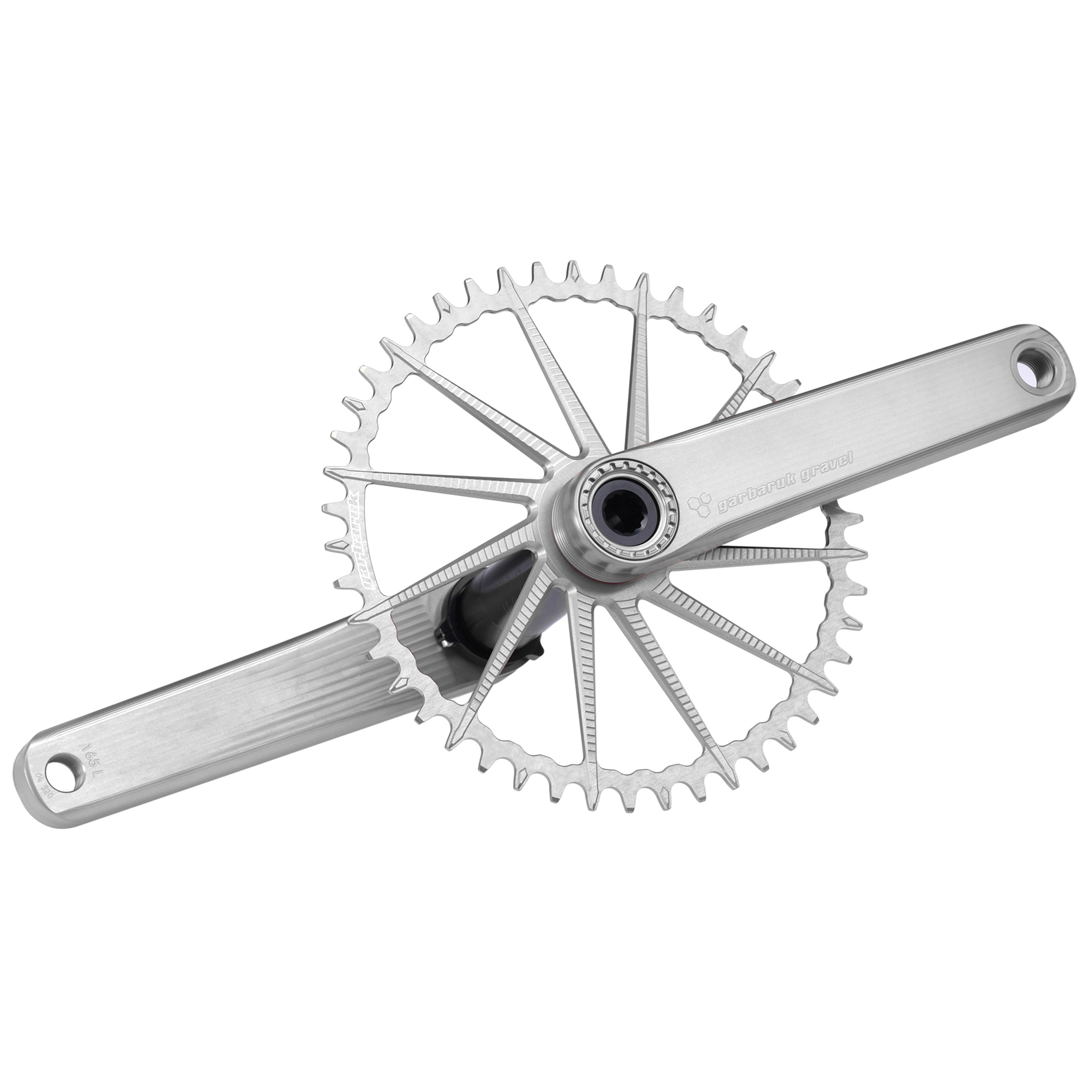 Garbaruk road/gravel crankset in silver with a matching silver Garbaruk  chainring, showcasing CNC-machined design and minimalist aesthetics