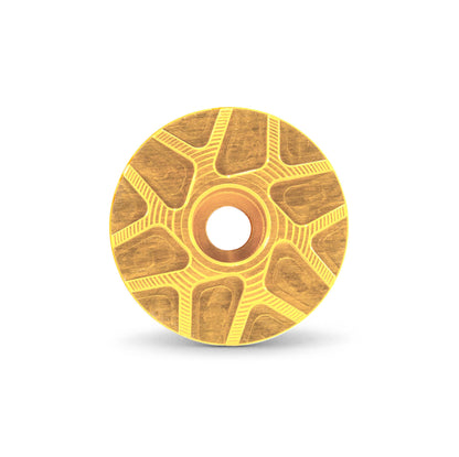Garbaruk stem cap in gold, showcasing CNC-machined detailing and precision-engineered finish