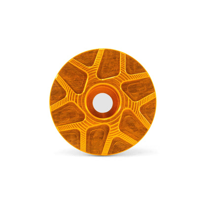 Garbaruk top cap in orange, showcasing CNC-machined detailing and precision-engineered finish