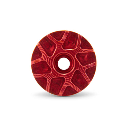 Garbaruk stem cap in red, showcasing eye-catching design and precision-machined finish