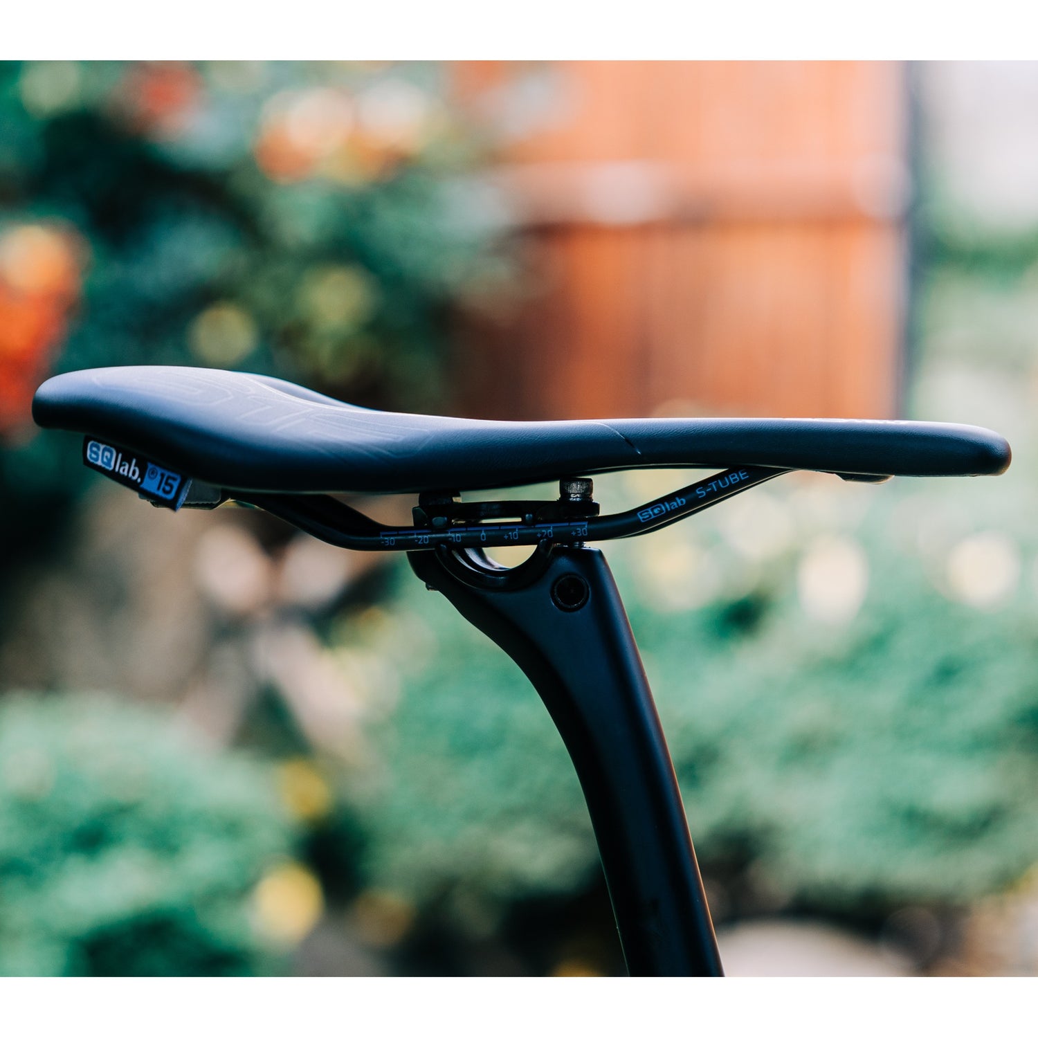 Side view of SQLab 612 Ergowave Active 2.1 saddle installed on a Bossi build, highlighting fit and finish in natural light