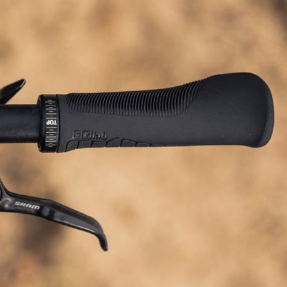 Close up of a SQLab 710 2.0 ergonomic bike grip fitted to a handlebar